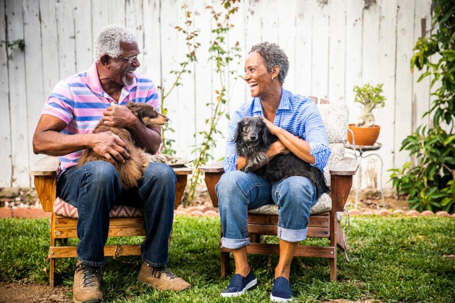 Senior Black Couple with their Dogs