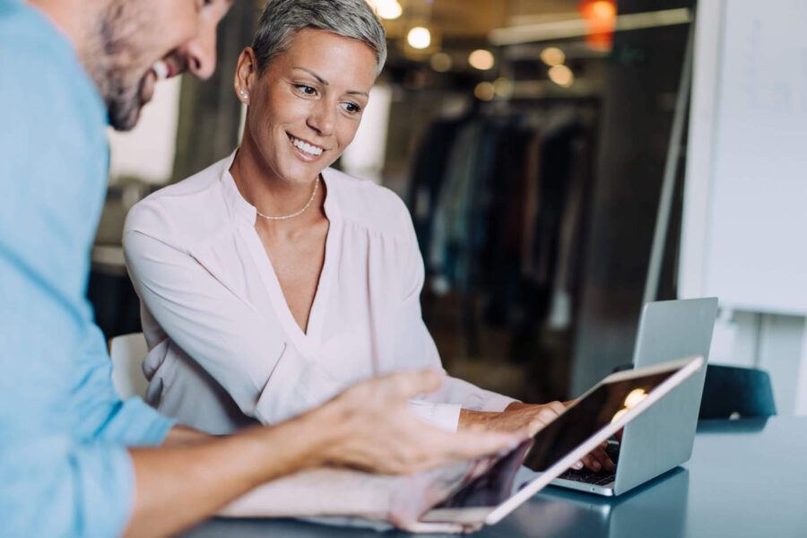 Man and woman discussing whether to take out a HELOC.